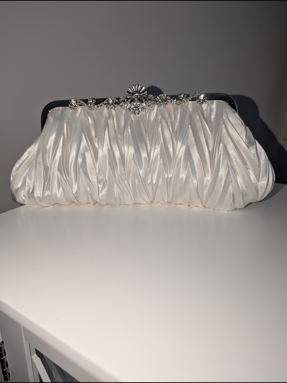 Elegant White Satin Ruched Clutch with Crystal Accent